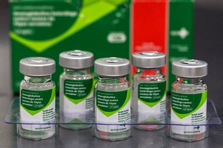 Five vials in a plastic tray