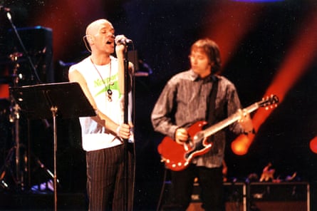 Michael Stipe and Peter Buck of REM on stage at a 1995 MTV Video Music Awards Show