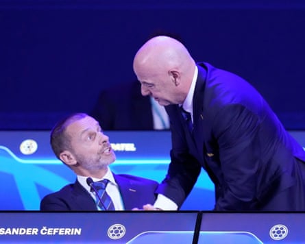Gianni Infantino talks with Uefa president Aleksander Ceferin (left) during the Fifa congress in Paraguay on Thursday.