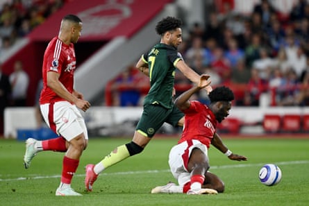 Kevin Schade takes advantage of Ola Aina’s slip to open the scoring.